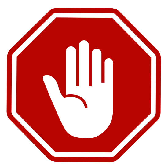 hand in the middle of a stop sign